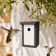Birdhouse black and white with roof flat