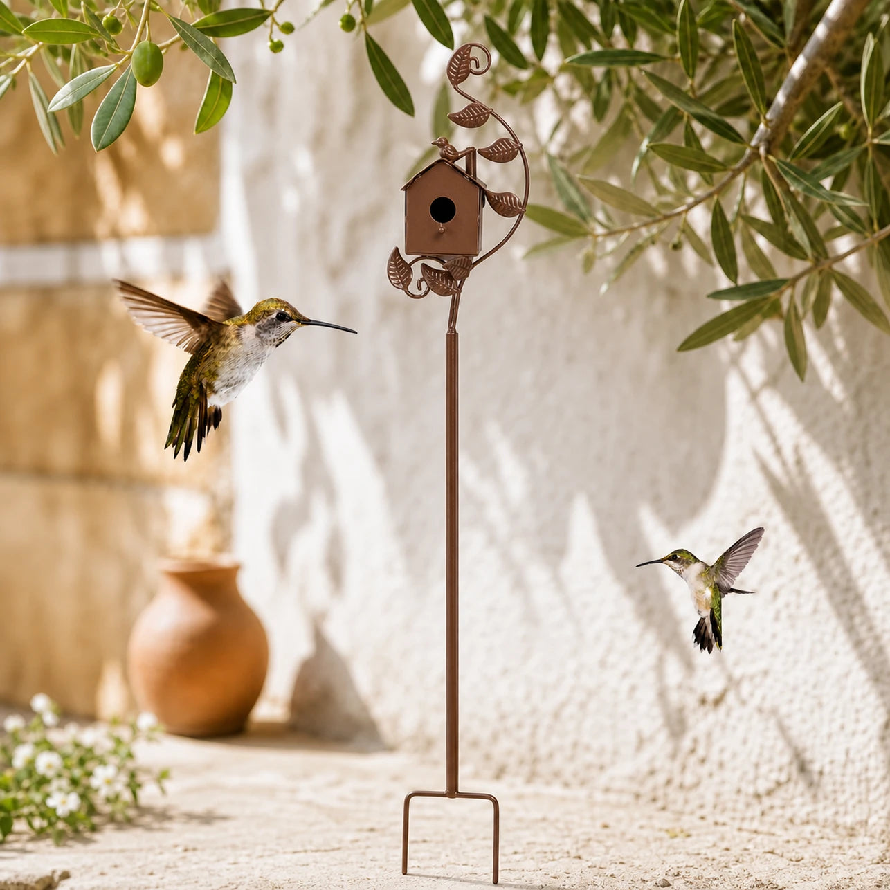 Birdhouse on stand in metal with stem decorative