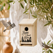 Birdhouse in wood with green roof red