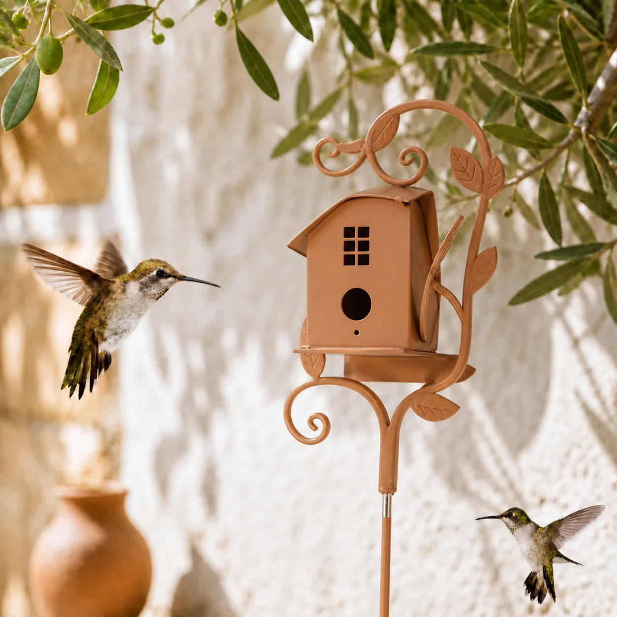 Birdhouse cottage in metal on with stake