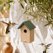 Birdhouse with green roof double slope