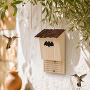 Bat box with roof in bark