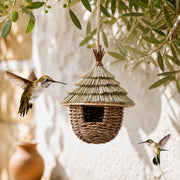 Birdhouse hanging in wood brown