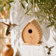 Birdhouse in wood flame