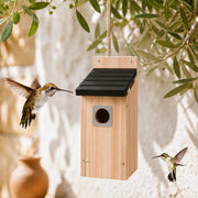 Birdhouse in wood beige with roof black and entrance metal