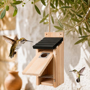 Birdhouse hanging in wood black