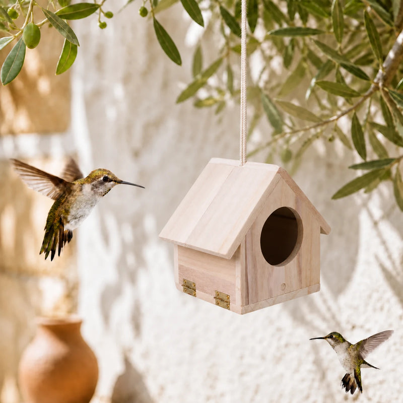 Birdhouse hanging in wood light with front opening