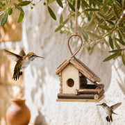 Birdhouse in wood hanging