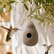 Birdhouse hanging in resin grey in shape of pebble