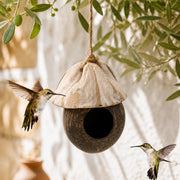 Birdhouse in coconut shell