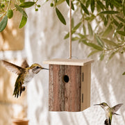 Birdhouse rustic in wood with front bark