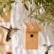Birdhouse in pine brown size 17 × 14 × 27 cm