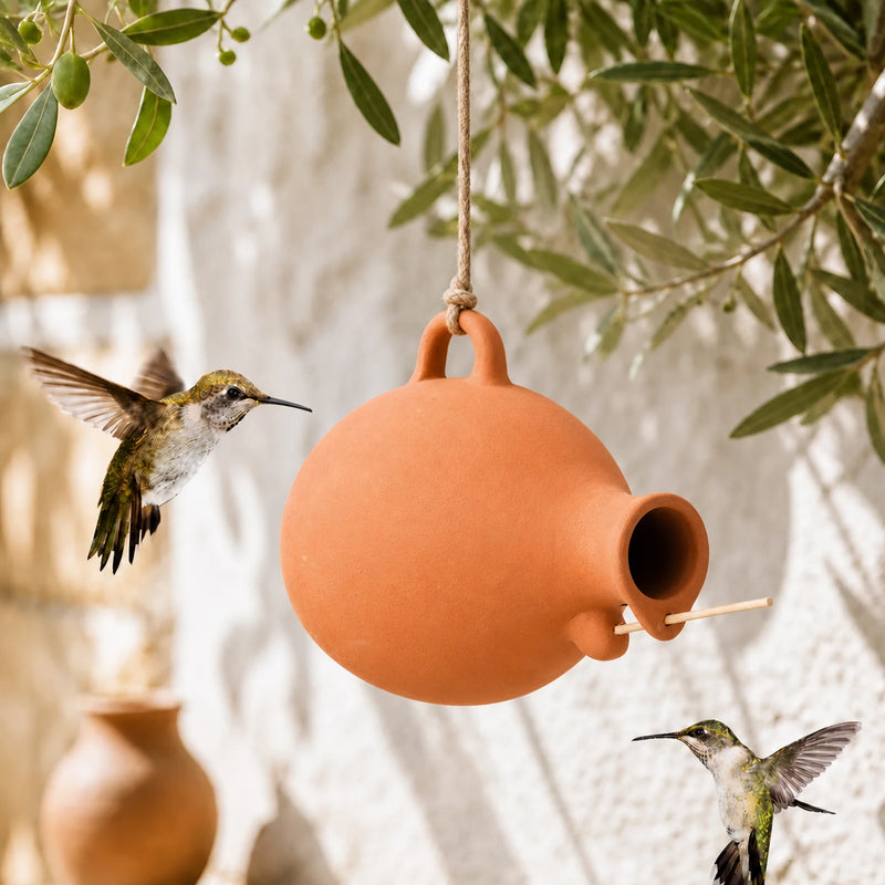 Birdhouse ball hanging in terracotta