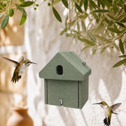 Birdhouse in concrete with entrance adjustable