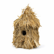 Birdhouse hanging in straw with roof of thatch — photo 2