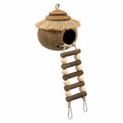 Birdhouse hanging in coconut shell with roof of straw — photo 3