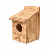 Birdhouse hanging in wood with roof with slats — photo 3