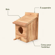 Birdhouse hanging in wood with roof with slats — photo 4